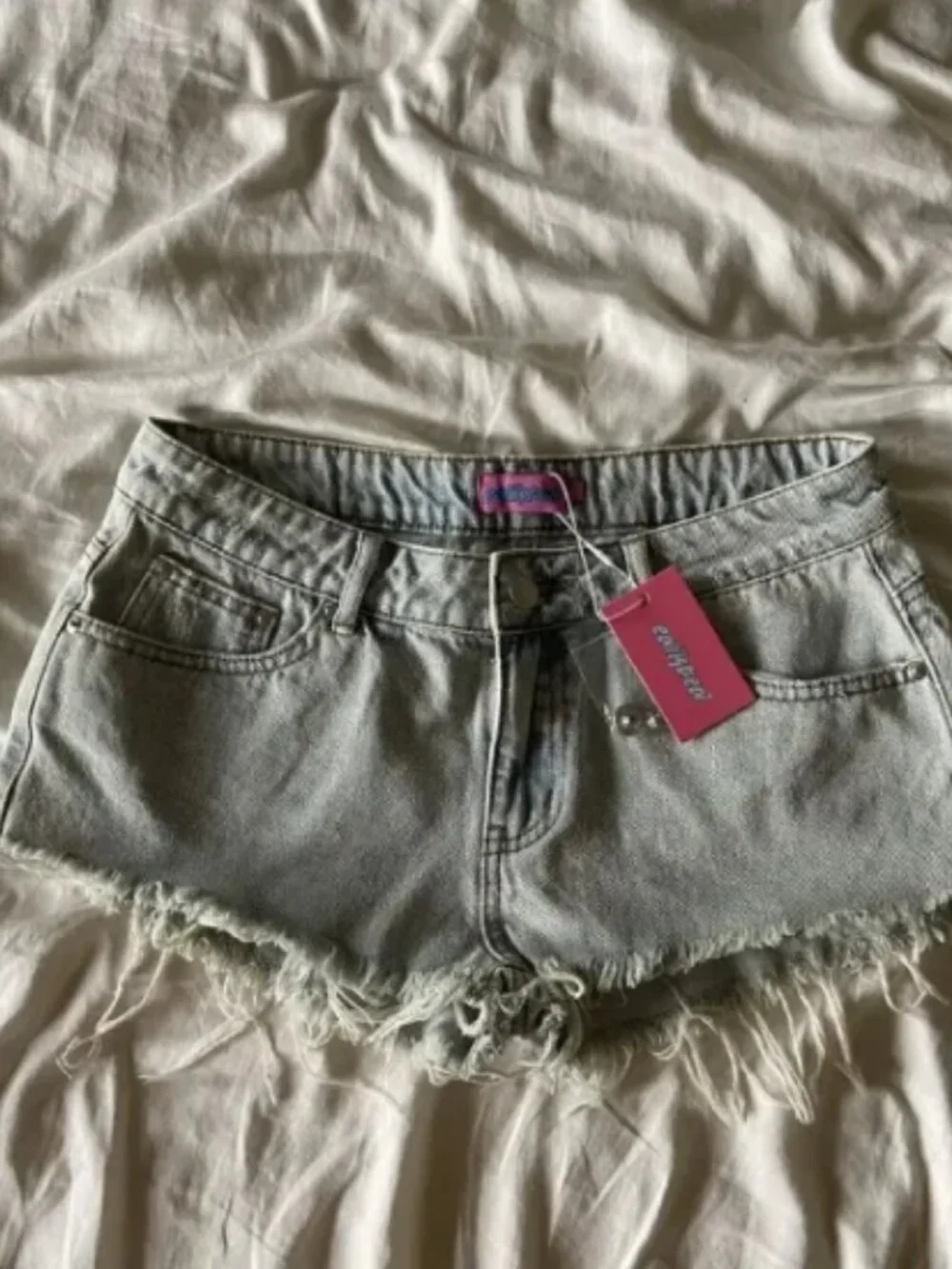 editked frayed vintage washed denim shorts